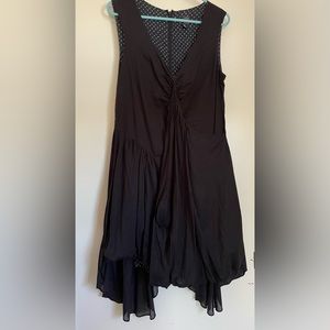 Black polka dot lining high/low mini dress from Kinder Aggugini